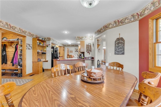 9903 Vermilion Rd, Amherst, OH 44001 - dining space with light wood-style flooring