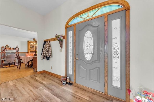 9903 Vermilion Rd, Amherst, OH 44001 - foyer entrance with wood finished floors and baseboards