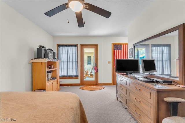 9903 Vermilion Rd, Amherst, OH 44001 - bedroom with an office area, light carpet, and baseboards