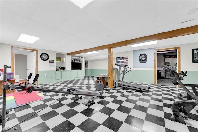 9903 Vermilion Rd, Amherst, OH 44001 - exercise room with tile patterned floors and baseboards