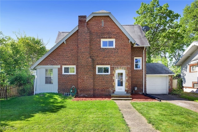 1608 Pilgrim St, Akron, OH 44305 - view of front of house with asphalt driveway, a chimney, brick siding, an attached garage, and roof with shingles