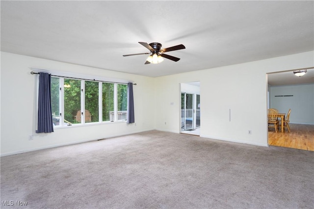 2966 Bancroft Rd, Fairlawn, OH 44333 - carpeted empty room featuring a ceiling fan and baseboards