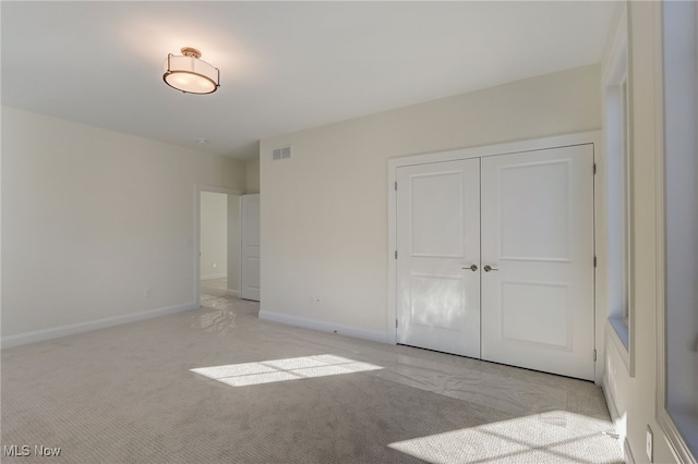 2540 Edgewood Trce, Pepper Pike, OH 44124 - unfurnished bedroom with light carpet, baseboards, and a closet