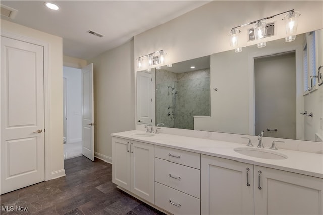 2540 Edgewood Trce, Pepper Pike, OH 44124 - bathroom with a shower stall, double vanity, baseboards, recessed lighting, and wood finished floors
