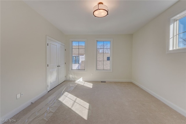 2540 Edgewood Trce, Pepper Pike, OH 44124 - unfurnished bedroom featuring carpet floors, multiple windows, and baseboards