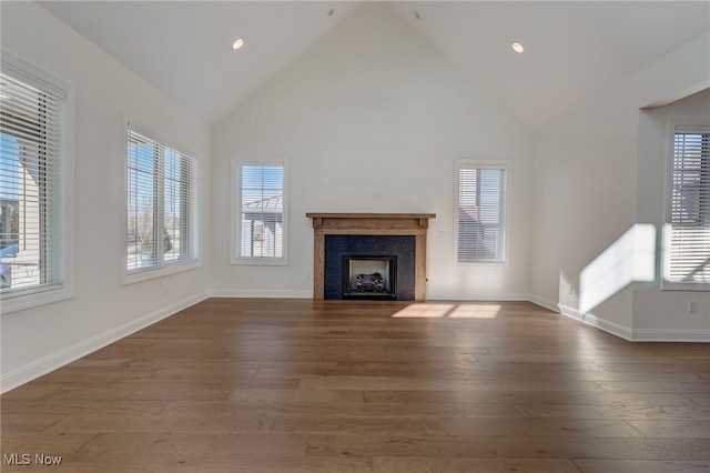 2540 Edgewood Trce, Pepper Pike, OH 44124 - unfurnished living room with wood finished floors, high vaulted ceiling, a fireplace, baseboards, and recessed lighting