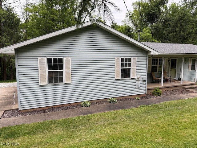 645 Arends Ridge Rd, Marietta, OH 45750 - view of side of home featuring a yard and a porch