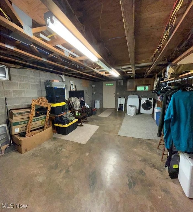 645 Arends Ridge Rd, Marietta, OH 45750 - unfinished basement with independent washer and dryer and concrete block wall