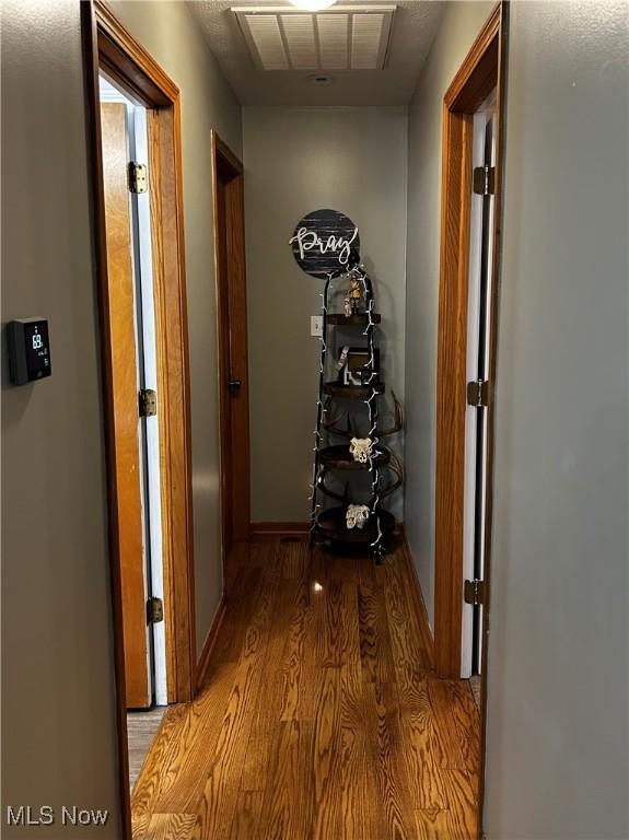 645 Arends Ridge Rd, Marietta, OH 45750 - corridor featuring light wood-style flooring and baseboards