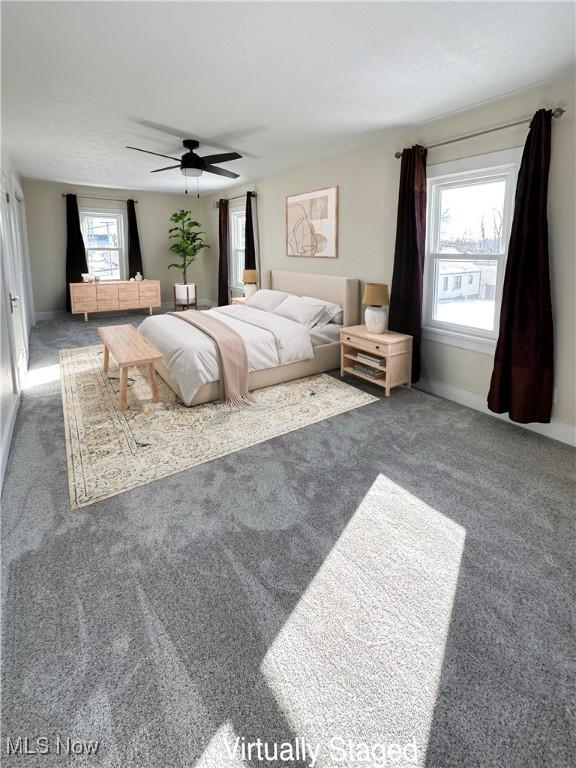 226 Cunningham Ln, Steubenville, OH 43952 - carpeted bedroom featuring ceiling fan and baseboards