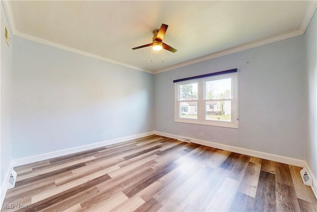 226 Cunningham Ln, Steubenville, OH 43952 - spare room with baseboards, a ceiling fan, wood finished floors, and crown molding