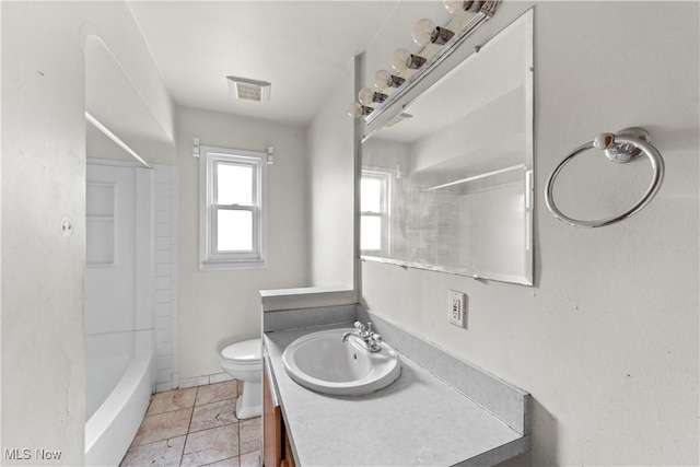 1613 Wexford Ave, Parma, OH 44134 - bathroom with vanity, toilet, and shower / tub combination