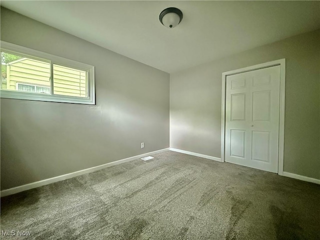 356 N Edgehill Ave, Austintown, OH 44515 - unfurnished bedroom with baseboards and carpet