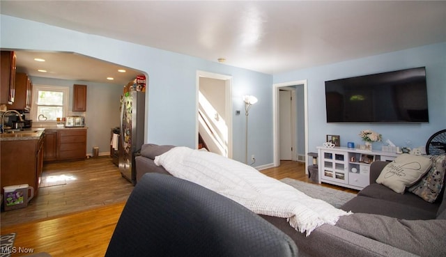 2464 Lyon Blvd, Poland, OH 44514 - living area featuring light wood-type flooring, recessed lighting, and baseboards