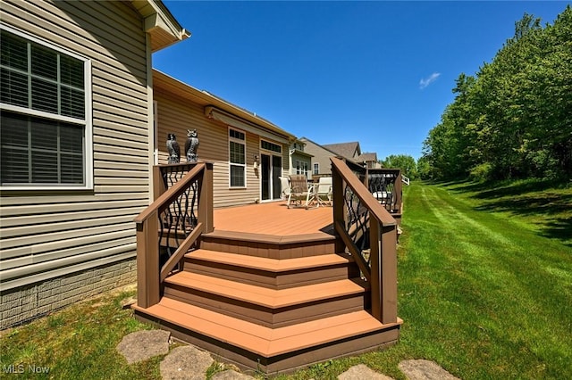 9339 Sasha Ct, Twinsburg, OH 44087 - wooden deck with a lawn