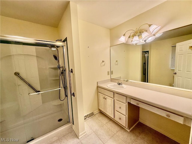 5228 Nashua Dr, Austintown, OH 44515 - full bath featuring a shower stall, vanity, tile patterned flooring, and baseboards