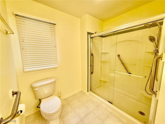 5228 Nashua Dr, Austintown, OH 44515 - full bathroom with a stall shower, toilet, and baseboards
