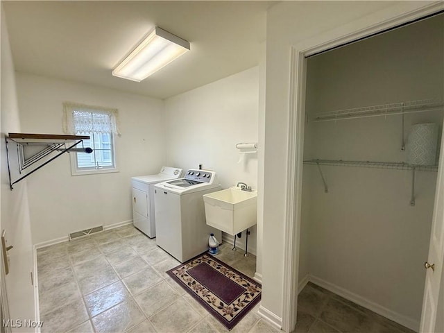 5228 Nashua Dr, Austintown, OH 44515 - laundry room featuring separate washer and dryer and baseboards