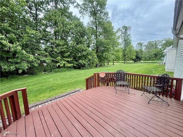 5228 Nashua Dr, Austintown, OH 44515 - wooden terrace with a lawn and view of scattered trees