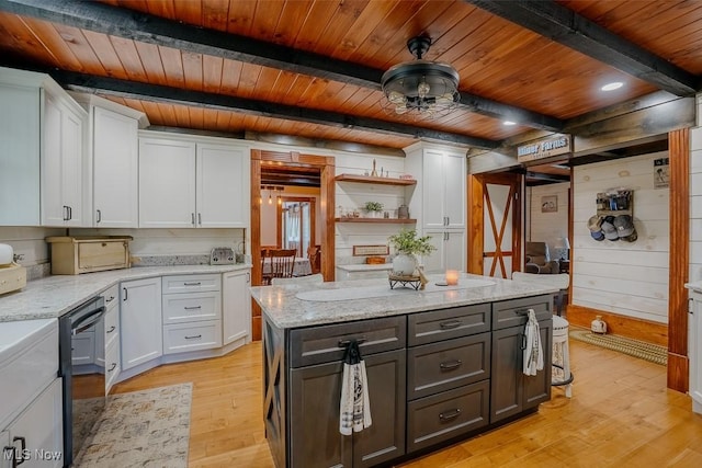 2953 State Route 225, Diamond, OH 44412 - kitchen with wood ceiling with exposed beams, white cabinetry, dishwasher, light wood finished floors, and light stone countertops