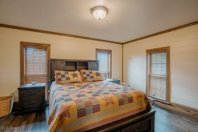 2953 State Route 225, Diamond, OH 44412 - bedroom featuring dark wood finished floors, wood walls, and ornamental molding