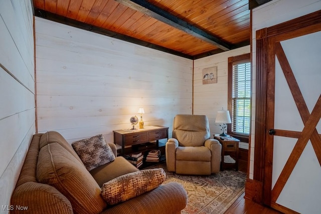 2953 State Route 225, Diamond, OH 44412 - sitting room with wooden walls, wood ceiling with exposed beams, and wood finished floors