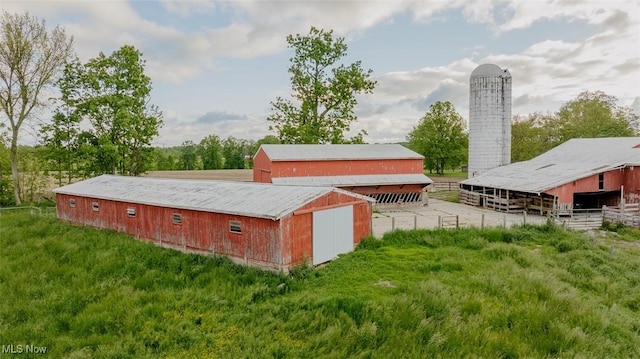2953 State Route 225, Diamond, OH 44412 - rear view of property featuring an outdoor structure, an exterior structure, an outbuilding, and a chimney