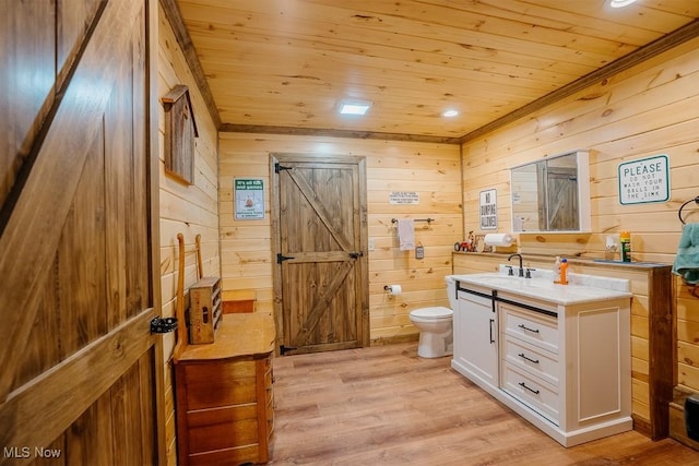 2953 State Route 225, Diamond, OH 44412 - bathroom featuring wood ceiling, vanity, toilet, wooden walls, and wood finished floors