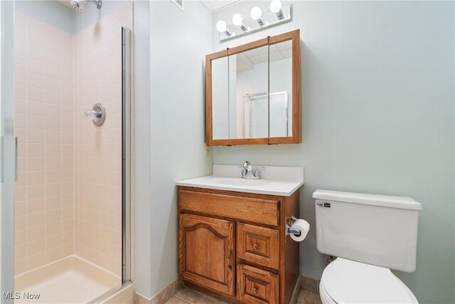 3751 Muirfield Dr, Uniontown, OH 44685 - full bath featuring toilet, a shower stall, and vanity