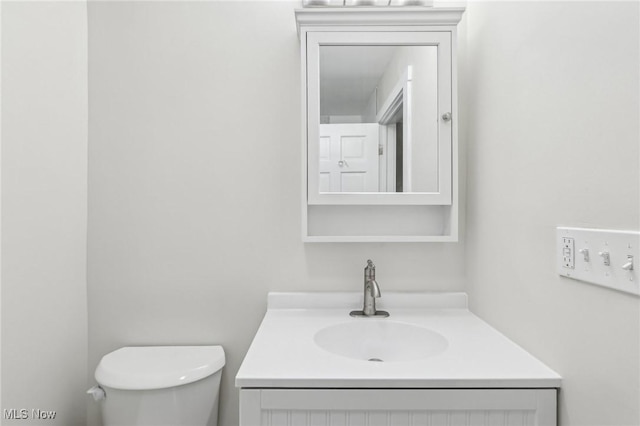 7558 E Parkside Dr, Boardman, OH 44512 - bathroom featuring toilet and vanity