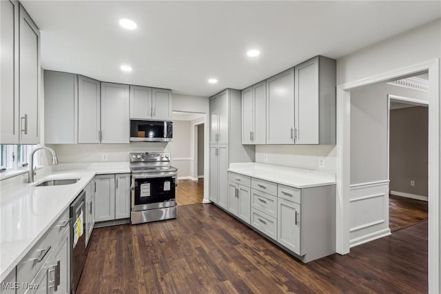 7558 E Parkside Dr, Boardman, OH 44512 - kitchen with stainless steel appliances, gray cabinetry, a sink, and recessed lighting