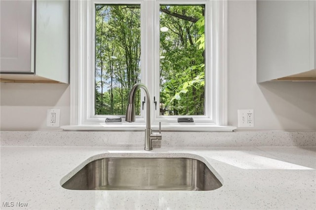 7558 E Parkside Dr, Boardman, OH 44512 - kitchen view of a sink and light stone counters