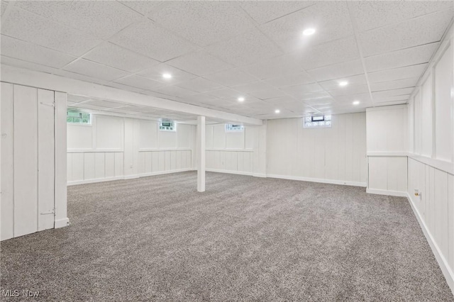 7558 E Parkside Dr, Boardman, OH 44512 - basement with carpet floors, a decorative wall, and recessed lighting