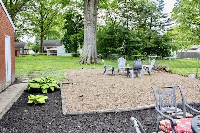 6892 Glenwood Ave, Youngstown, OH 44512 - view of yard with an outdoor fire pit