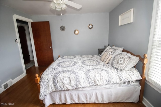 6892 Glenwood Ave, Youngstown, OH 44512 - bedroom featuring wood finished floors, baseboards, and ceiling fan