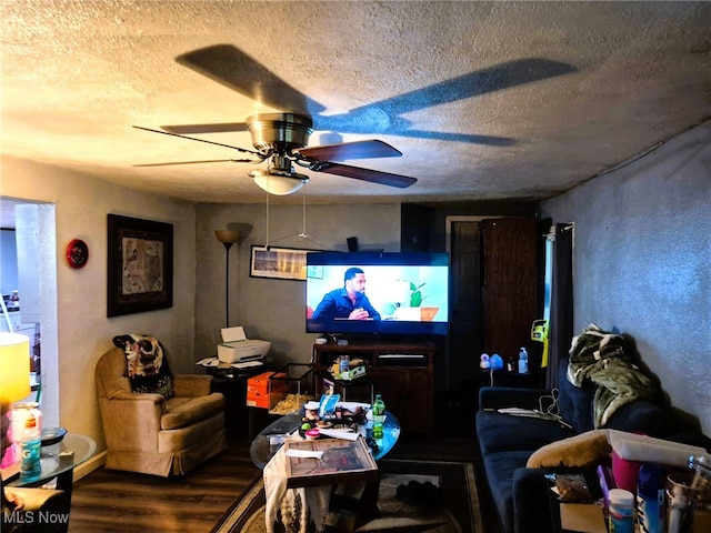 932 Logan St, East Liverpool, OH 43920 - living room with wood finished floors, a ceiling fan, and a textured ceiling