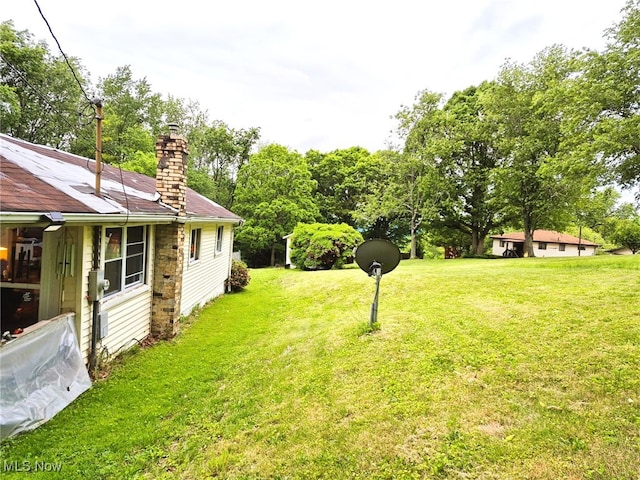 932 Logan St, East Liverpool, OH 43920 - view of green lawn with view of wooded area