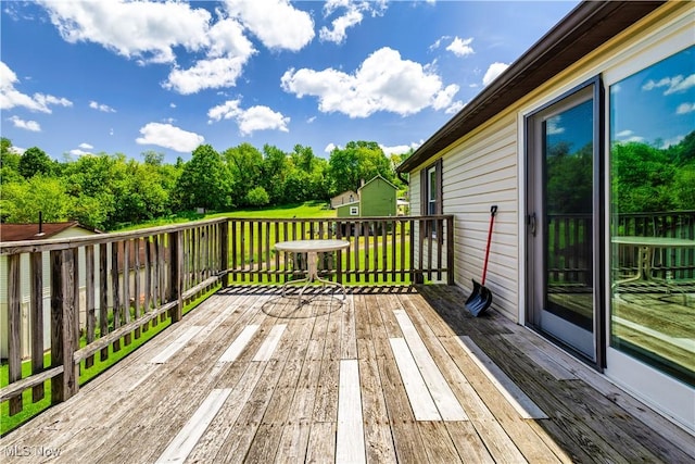 106 High St, Bloomingdale, OH 43910 - wooden deck with view of wooded area