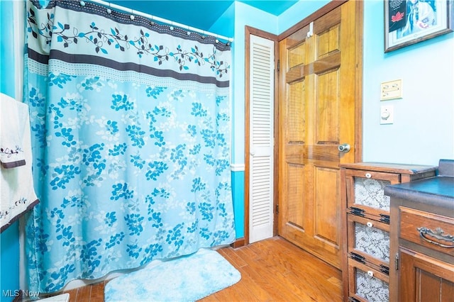 106 High St, Bloomingdale, OH 43910 - full bathroom featuring wood finished floors and curtained shower