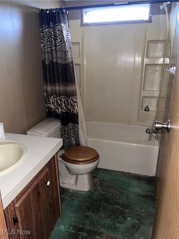 106 High St, Bloomingdale, OH 43910 - bathroom featuring shower / bath combo with shower curtain, vanity, and toilet