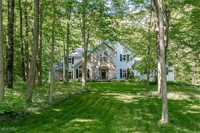 8698 Chase Dr, Chagrin Falls, OH 44023 - view of front of home with stone siding and a front lawn