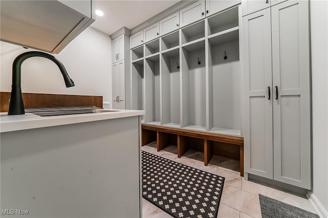 8698 Chase Dr, Chagrin Falls, OH 44023 - mudroom featuring a sink and recessed lighting