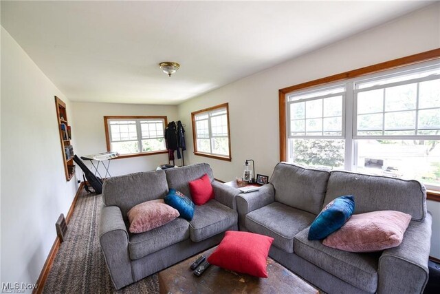 3000AND2996 Kemble Ave, Coventry, OH 44319 - living room featuring baseboards