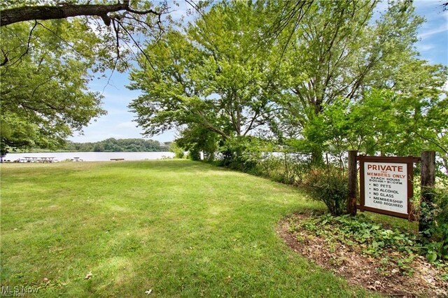 3000AND2996 Kemble Ave, Coventry, OH 44319 - surrounding community featuring a water view and a lawn