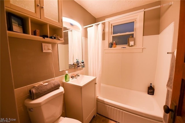 3000AND2996 Kemble Ave, Coventry, OH 44319 - bathroom with toilet, vanity, and shower / bathtub combination with curtain