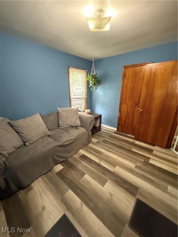 7511 Jameson Rd, Parma, OH 44129 - living area featuring wood finished floors and baseboards