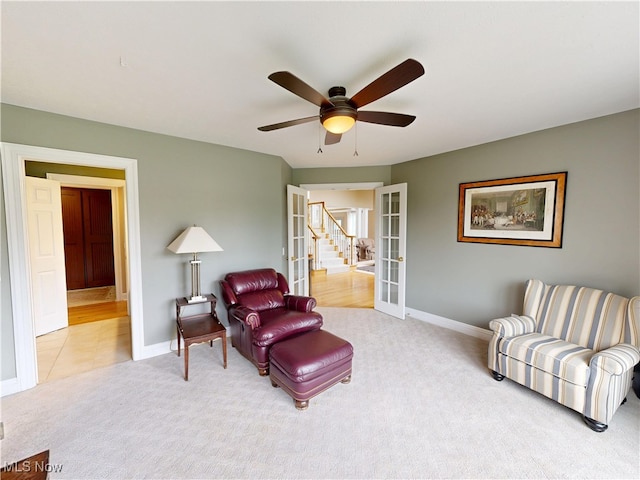 8836 Shetland Ct, Kirtland, OH 44094 - sitting room featuring carpet floors, stairway, ceiling fan, and baseboards