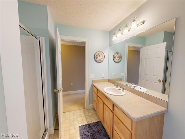 8836 Shetland Ct, Kirtland, OH 44094 - bathroom with a stall shower, vanity, baseboards, and tile patterned floors
