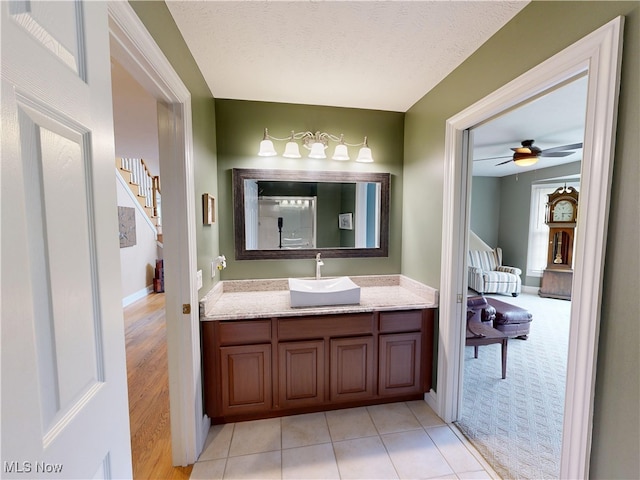 8836 Shetland Ct, Kirtland, OH 44094 - bathroom with vanity, ceiling fan, and baseboards
