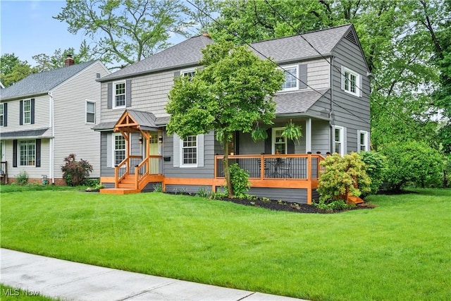 4493 Golfway Rd, South Euclid, OH 44121 - view of front of house featuring a shingled roof and a front lawn